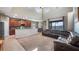 Spacious living room featuring an open floor plan and natural light at 412 Arbor Pointe Ave, Minneola, FL 34715