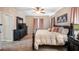 Spacious main bedroom with ensuite bathroom and large closet at 412 Arbor Pointe Ave, Minneola, FL 34715