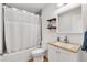 Well-lit bathroom with a shower-tub combo and a modern white vanity at 4723 Cr 306, Lake Panasoffkee, FL 33538
