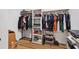 Organized closet with clothing racks, shelves, and ample storage space at 4723 Cr 306, Lake Panasoffkee, FL 33538