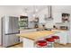 Modern kitchen with stainless steel appliances, butcher block island, and subway tile backsplash at 4723 Cr 306, Lake Panasoffkee, FL 33538