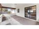 Covered patio with sliding glass doors leading to the interior of the house at 4723 Cr 306, Lake Panasoffkee, FL 33538