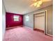 Spacious bedroom with large closet and windows for natural light at 4918 County Road 114, Wildwood, FL 34785