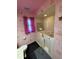 Bathroom with floral wallpaper, a marble vanity, and a walk-in bathtub at 5 Magnolia Ln, Yalaha, FL 34797