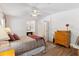 Comfortable bedroom with a bed and wooden furniture at 520 Saint Andrews Blvd, The Villages, FL 32159