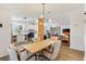 Inviting open-concept living area that connects dining room, kitchen, and living room together at 520 Saint Andrews Blvd, The Villages, FL 32159