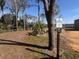 Lakeside area with signage indicating private dock access for residents, emphasizing the community's exclusive waterfront amenities at 600 Arlington Ct, Eustis, FL 32726