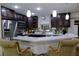 Well-equipped kitchen featuring granite countertops, and stainless steel appliances at 600 Urick St, Fruitland Park, FL 34731