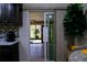 View from kitchen to sunroom featuring natural light and outside scenery at 600 Urick St, Fruitland Park, FL 34731