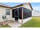 View of the sunroom attached to the house at 606 San Maria Street, Lady Lake, FL 32159