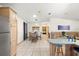 Spacious home featuring an open floor plan with stainless steel appliances and dining area at 705 Cortez Ave, The Villages, FL 32159
