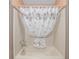 Bright bathroom featuring a shower and decorative curtain at 736 Heathrow Ave, The Villages, FL 32159