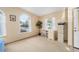 Functional office space featuring neutral walls and large windows for natural light at 736 Heathrow Ave, The Villages, FL 32159