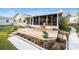 Beautiful yard, patio and lanai showcasing great outdoor living space at 736 Heathrow Ave, The Villages, FL 32159