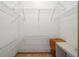 Walk-in closet with ample shelving, hanging space, and natural light at 736 Heathrow Ave, The Villages, FL 32159
