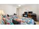 This is the view of the spacious bedroom area featuring two twin beds and two desks at 8294 Se 177Th Winterthur Loop, The Villages, FL 32162