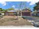 Charming single-story home with a well-maintained yard and inviting curb appeal at 909 Palm Forest Ln, Minneola, FL 34715