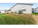 A nicely landscaped backyard with lush grass and rock garden at 9312 Se 172Nd Wayside Pl, The Villages, FL 32162