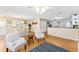 Bright open-concept living space with dining area and comfortable seating, perfect for Gathering at 9312 Se 172Nd Wayside Pl, The Villages, FL 32162