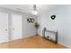 Bright room with hardwood floors and grey accents at 9312 Se 172Nd Wayside Pl, The Villages, FL 32162
