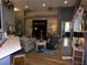 Spacious living room featuring modern furnishings, a large TV, and an open layout perfect for entertaining at 10173 Julia Isles Ave, Oxford, FL 34484