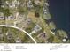 An aerial view of the property lines, surrounding neighborhood, and lake access at 10648 Lake Hill Dr, Clermont, FL 34711