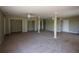 Open living room featuring neutral colors and carpeted floors at 10648 Lake Hill Dr, Clermont, FL 34711