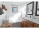 Bright bathroom with double sink vanity and soaking tub at 10910 Rushwood Way, Clermont, FL 34714
