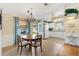 Bright kitchen and dining area featuring modern appliances and stylish decor at 1523 W Schwartz Blvd, The Villages, FL 32159