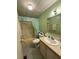 Full bathroom with tub, shower, vanity, and neutral color scheme, creating a clean and functional space at 1532 W Schwartz Blvd, Lady Lake, FL 32159