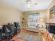 Comfortable bedroom featuring a ceiling fan, neutral walls, and ample natural light at 17504 Se 119Th Cir, Summerfield, FL 34491