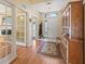 Inviting foyer with hardwood floors, a decorative rug, and natural light at 17504 Se 119Th Cir, Summerfield, FL 34491