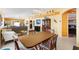Bright dining area with a living room and a table at 1952 Peachtree Ave, The Villages, FL 32162