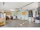 A spacious garage has appliances and storage space at 1952 Peachtree Ave, The Villages, FL 32162
