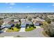 Expansive aerial view of a well-planned community showcasing meticulously maintained homes and lush landscaping at 2116 Baldwin Run, The Villages, FL 32162