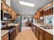 Well-equipped kitchen with stainless steel appliances, ample cabinet space, and a functional layout at 21902 King Henry Ave, Leesburg, FL 34748