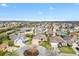Aerial view showcasing the single Gathering homes in a well-kept neighborhood at 2197 Derringer Ave, The Villages, FL 32162
