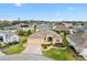 Beautiful aerial view of the home, showcasing its landscaped yard and community at 2197 Derringer Ave, The Villages, FL 32162
