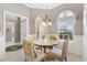 Bright breakfast nook with cozy seating area and lots of natural light at 2197 Derringer Ave, The Villages, FL 32162