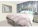 Stylish bedroom design with elegant furniture and decorative wall at 22325 Sw Nectarine Ln, Dunnellon, FL 34431