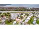 Aerial view of the neighborhood showing the property's location near a lake and highway at 2714 Vindale Rd, Tavares, FL 32778