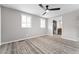 Bedroom with carpet and ceiling fan with view to bathroom at 2714 Vindale Rd, Tavares, FL 32778