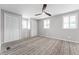 Bright bedroom with large closets, neutral paint, carpeting, and ceiling fan at 2714 Vindale Rd, Tavares, FL 32778