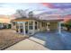 Beautiful home featuring a carport and drought-resistant landscaping, perfect for low-maintenance living at 2714 Vindale Rd, Tavares, FL 32778