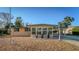 Charming single-story home with a well-maintained gravel front yard and covered parking, offering curb appeal at 2714 Vindale Rd, Tavares, FL 32778
