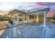 Charming home exterior featuring a covered carport, well-manicured landscaping, and an inviting entrance at 2714 Vindale Rd, Tavares, FL 32778