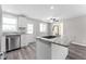 Modern kitchen with stainless steel appliances and granite countertops at 2714 Vindale Rd, Tavares, FL 32778
