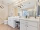 Large bathroom features double sinks and vanity area at 27536 Stoney Brook Dr, Leesburg, FL 34748