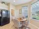 Cozy breakfast nook with a table and chairs, next to the kitchen at 27536 Stoney Brook Dr, Leesburg, FL 34748