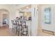 Kitchen bar with seating located near the front door at 27536 Stoney Brook Dr, Leesburg, FL 34748